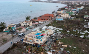Damaged houses and building along the shore are seen in a drone photograph after the passage of Hurricane Beryl, on the island of Carriacou, Grenada [Arthur Daniel/Reuters]